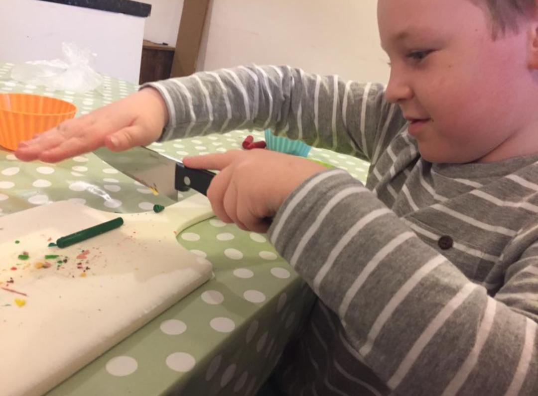 Cutting the crayons for the Melted crayon glass ornaments