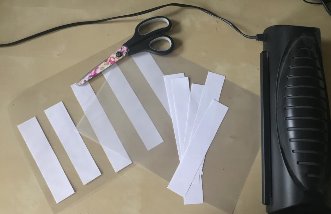 Preparing the bookmarks using a laminator