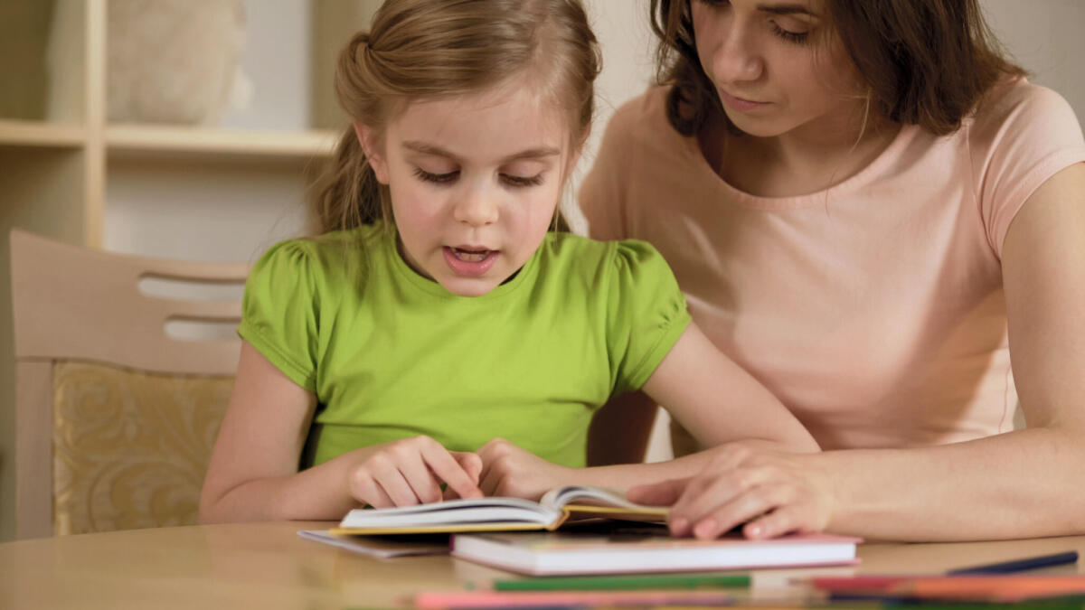 Child being tutored after school