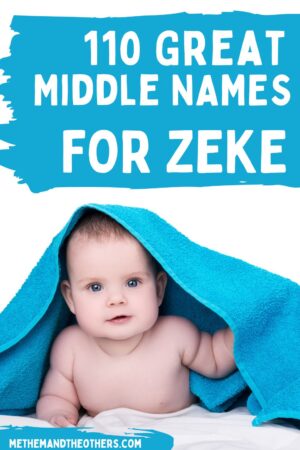 Surprised smiling baby with big blue eyes lying on belly under the blue towel after shower, isolated on white background. Text reads "110 great middle names for Zeke"