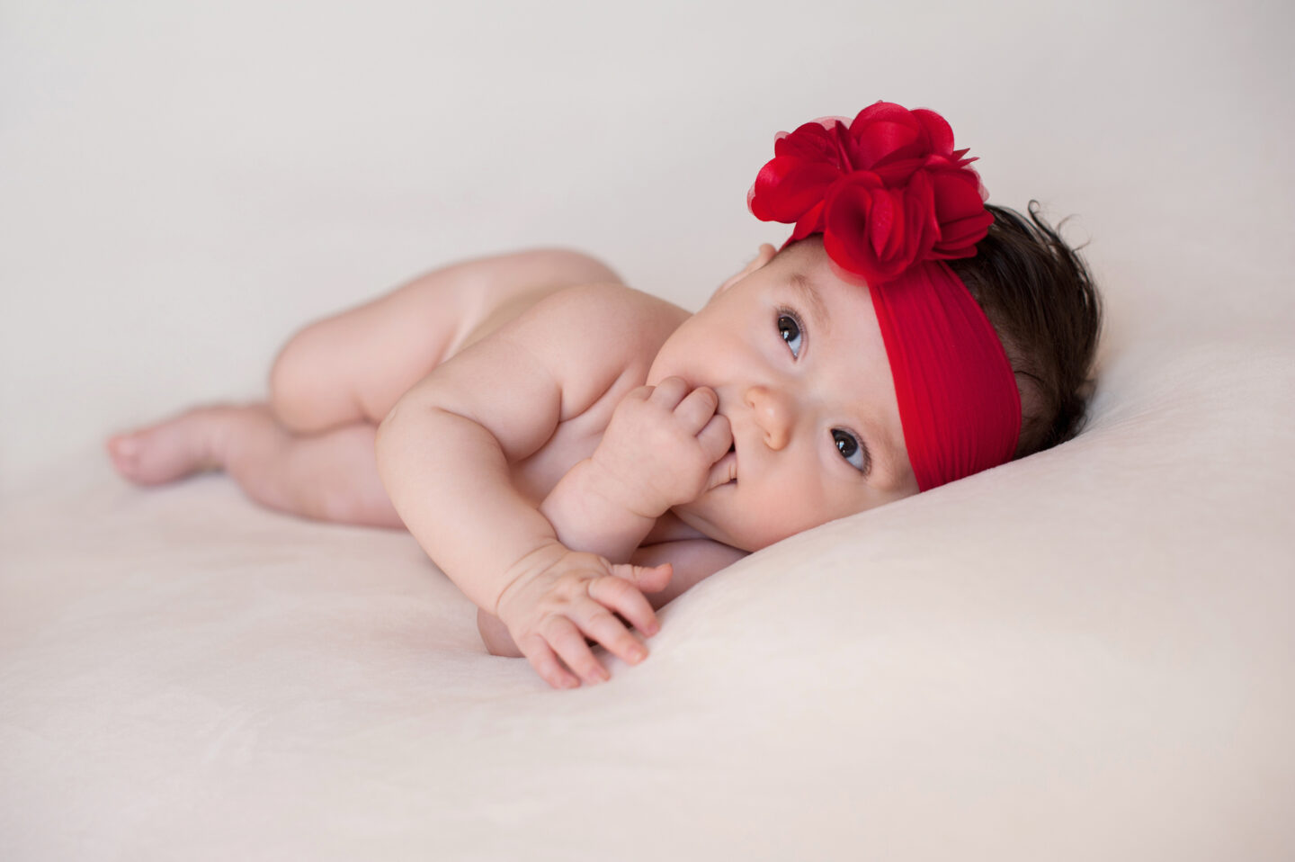 Baby Girl with a Large, Red, Flower Headband