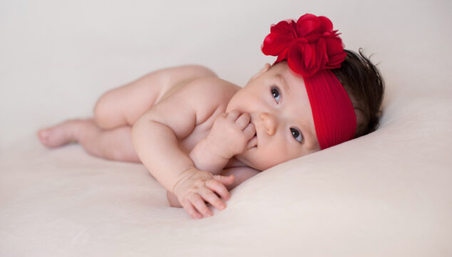 Baby Girl with a Large, Red, Flower Headband